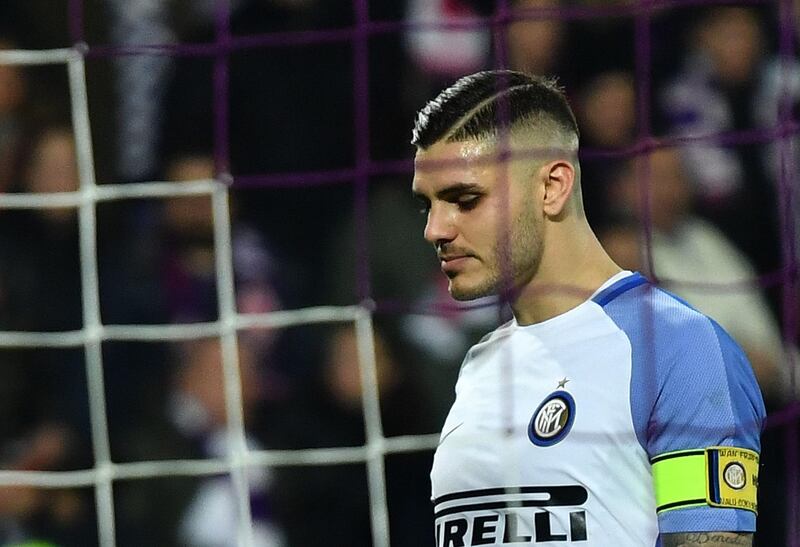 Inter Milan's Argentinian forward Mauro Icardi reacts at the end of the Italian Serie A football match between Fiorentina and Inter Milan at The Artemio Franchi Stadium in Florence on January 5, 2018. / AFP PHOTO / ALBERTO PIZZOLI