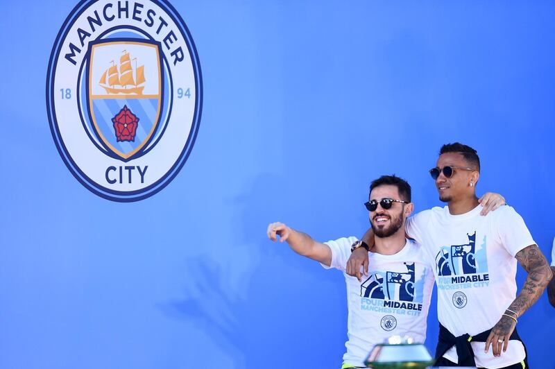 Bernardo Silva and Danilo of Manchester City celebrate on stage during the Manchester City Teams Celebration Parade in Manchester, England. Getty Images