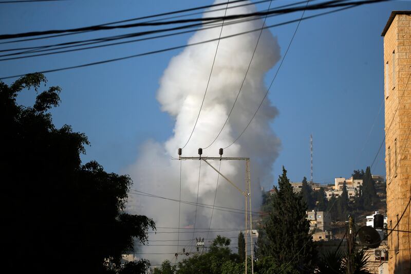 Smoke rises as the Israeli military conducts air raids in Jenin. EPA