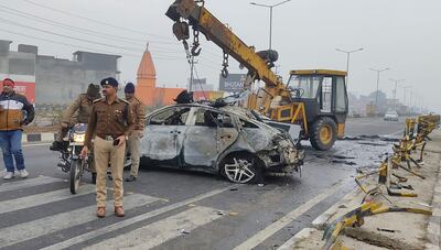 Policemen investigate the scene of a car accident near Roorkee, in the northern Indian state of Uttarakhand on December 30, 2022. Rishabh Pant was driving the car that overturned and caught fire after hitting a road divider. AP