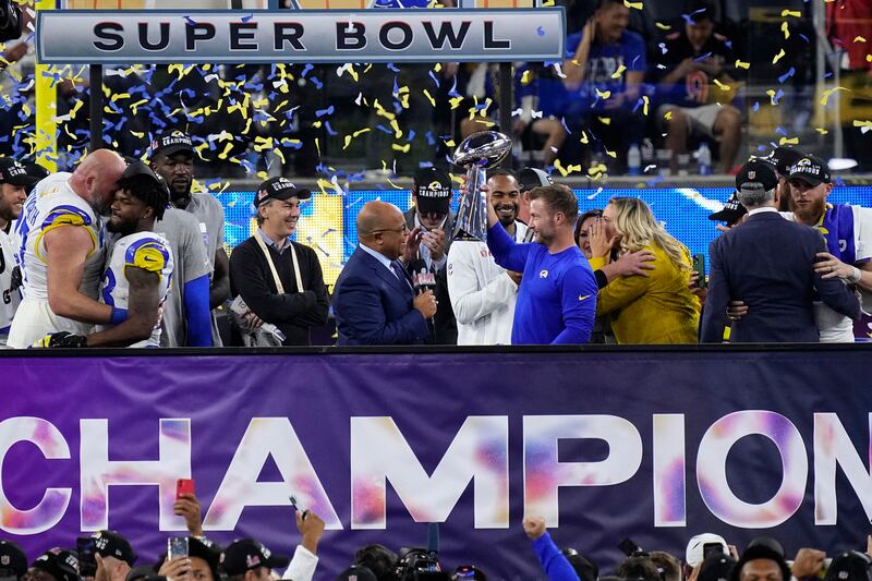 Los Angeles Rams head coach Sean McVay holds the Lombardi Trophy. Reuters
