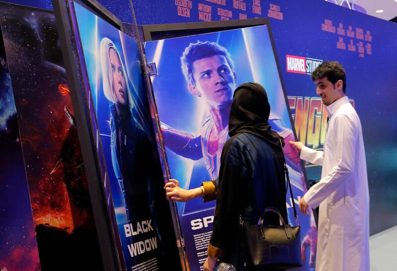 epa06703920 People attend the inaugration of the first VOX Cinemas multiplex at Riyadh Park mall, in Riyadh, Saudi Arabia, 30 April 2018 (issued 01 May 2018). The multiplex theater will feature four screens. Marvel's Black Panther movie was the first commercial film to be publicly screened in Saudi Arabia in another cinema in more than 35 years on 18 April 2018.  EPA/AHMED YOSRI