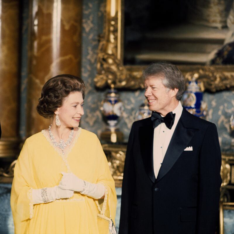 The queen and Carter at a state dinner at Buckingham Palace. PA