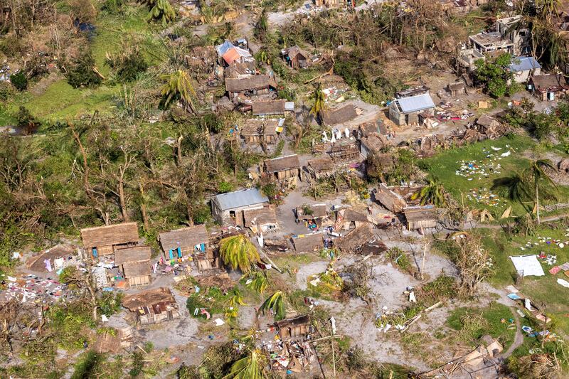Houses in the town of Mananjary, Madagascar, damaged by Cyclone Batsirai. The storm, with winds of up to 235 kilometres an hour, destroyed villages and killed at least 20 people. Reuters