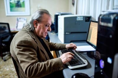 Sener Levent, chief editor of Afrika Gazetesi newspaper, edits an article in the outlet's newsroom at its headquarters in the northern side of the Cypriot capital Nicosia in the self-proclaimed Turkish Republic of Northern Cyprus (TRNC), on December 13, 2018. Jail time and angry mobs -- editor Sener Levent has paid a price for challenging the might of Turkey's President Recep Tayyip Erdogan and local authorities in breakaway northern Cyprus with his newspaper. In January, hundreds of protesters attacked the offices of the newspaper -- a tiny daily with a 1,500 circulation in a statelet of around 300,000 people -- after it ran an article criticising a Turkish military offensive against the Kurdish border enclave of Afrin in Syria. / AFP / Amir MAKAR

