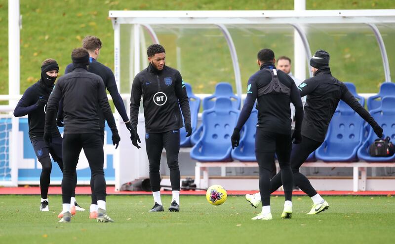 Joe Gomez and England teammates take part in a training session. Reuters