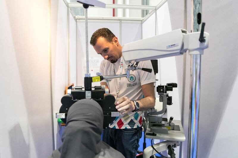 ABU DHABI, UNITED ARAB EMIRATES - MARCH 18, 2018.

Eye test carried out in the Healthy Athletes center at IX MENA Special Olympic games held at Abu Dhabi National Exhibition Center.

The Healthy Athletes program provides free health screenings for 1,500 people with intellectual and physical challenges during the games. 

(Photo: Reem Mohammed/ The National)

Reporter:  Ramola Talwar
Section:  SP