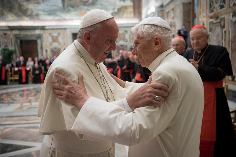 Former pope Benedict, right, with Pope Francis at a ceremony to mark the 65th anniversary of his ordination. Reuters