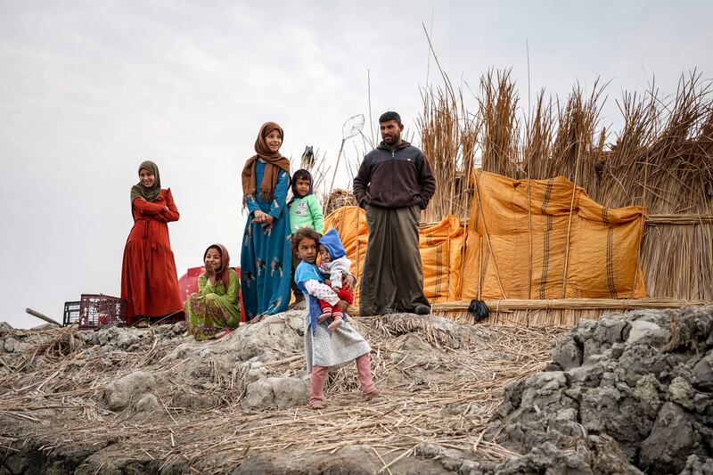 Samir Abdullah poses with his family. All photos: Ishtar Obaid