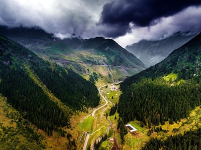 An aerial view of the Carpathian mountains in Romania. Unsplash