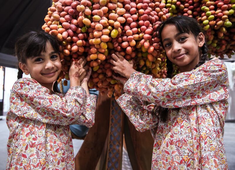The Alamri sisters, Mira, 6, and Maha, 7, at the Liwa Date Festival. All photos: Victor Besa / The National
