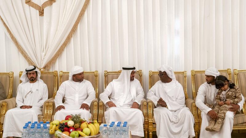 FUJAIRAH, UNITED ARAB EMIRATES - February 21, 2018: HH Sheikh Mohamed bin Zayed Al Nahyan, Crown Prince of Abu Dhabi and Deputy Supreme Commander of the UAE Armed Forces (3rd L) offers condolences to the family of the martyr Ali Khalifa Hashel Al Mesmari, who passed away while serving the UAE Armed Forces in Yemen. Seen with HH Sheikh Khalifa bin Tahnoon bin Mohamed Al Nahyan, Director of the Martyrs' Families' Affairs Office of the Abu Dhabi Crown Prince Court (L).

( Rashed Al Mansoori / Crown Prince Court - Abu Dhabi )
---