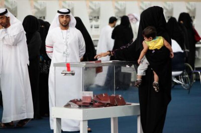 September 24. Voters que to cast their ballot at the Exhibition center in Ras Al Khaimah city for thre Federal National Council elections. September 24, Ras Al Khaimah, United Arab Emirates (Photo: Antonie Robertson/The National)