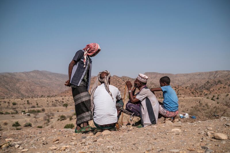 Internally displaced people gather near Erebti, Ethiopia. AFP