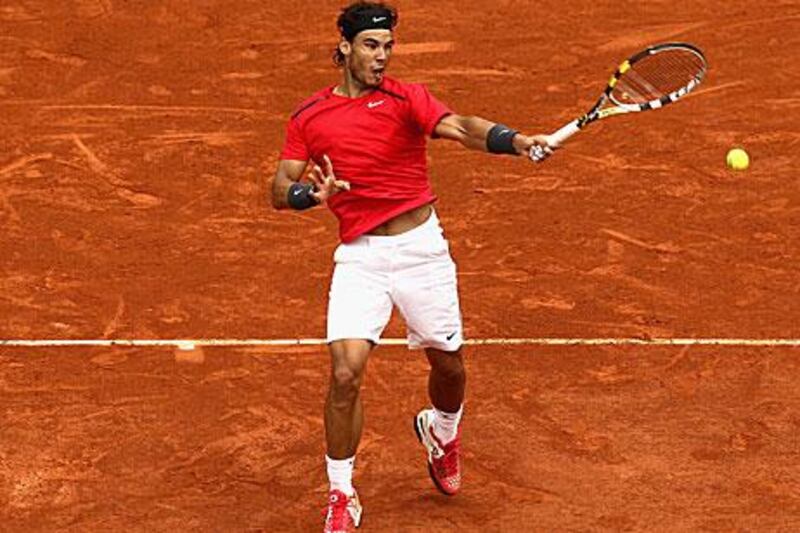 Rafael Nadal plays a forehand during his seventh French Open win.