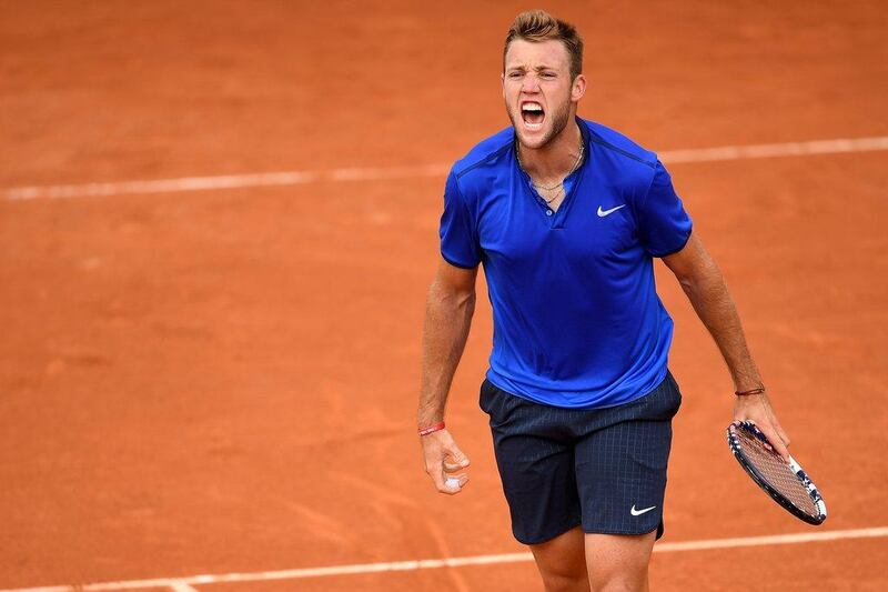 Jack Sock of the United States reacts during the Men’s Singles first round match against Robin Haase of the Netherlands on day two of the 2016 French Open at Roland Garros on May 23, 2016 in Paris, France. (Dennis Grombkowski/Getty Images)