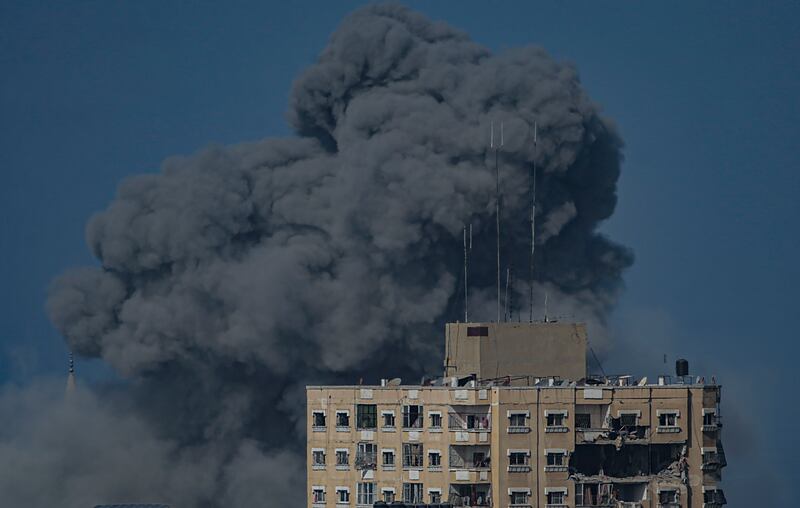 Smoke rises after air strikes during direct combat between the Israeli army and Hamas, near the beach road in Gaza city. EPA