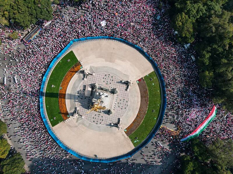 A rally at Mexico City's 'Angel of Independence' monument to support the country's elections institute, which President Andres Manuel Lopez Obrador wants to overhaul. AP Photo