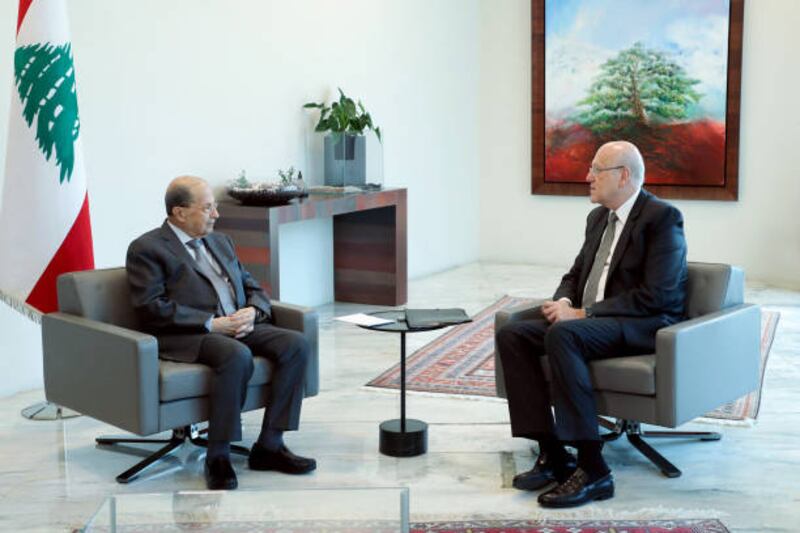 Former Prime Minister Najib Mikati (R) meets president Michel Aoun (L) in Beirut, Lebanon on August 05, 2021. (Photo by presidency)
