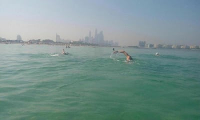 Kieran Ballard-Tremer, Brett Hallam and Lottie Lucas swam 85 kilometres over several weekends along the UAE coastline. Courtesy of Goumbook