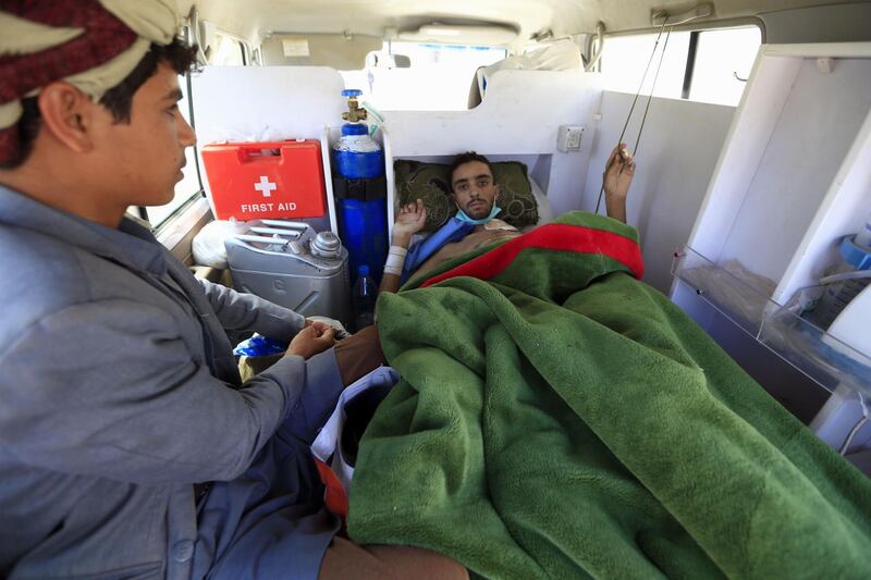 A wounded Yemeni rebel is transported by ambulance to the the Sanaa International Airport, before being evacuated to the Omani capital Muscat for treatment, on December 3, 2018. AFP