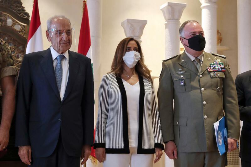 Lebanese Parliament Speaker Nabih Berri, left, the Head of Mission and Force Commander of the United Nations Interim Force in Lebanon (UNIFIL), Major-General Stefano Del Col from Italy, right, and Lebanese outgoing Defense Minister Zeina Akar, center, pose for a picture during a news conference, in Beirut, Lebanon, Thursday, Oct. 1, 2020. Berri announced Thursday that an agreement has been reached on a framework of indirect talks between Lebanon and Israel over the longstanding disputed maritime border between the two countries. (AP Photo / Bilal Hussein)