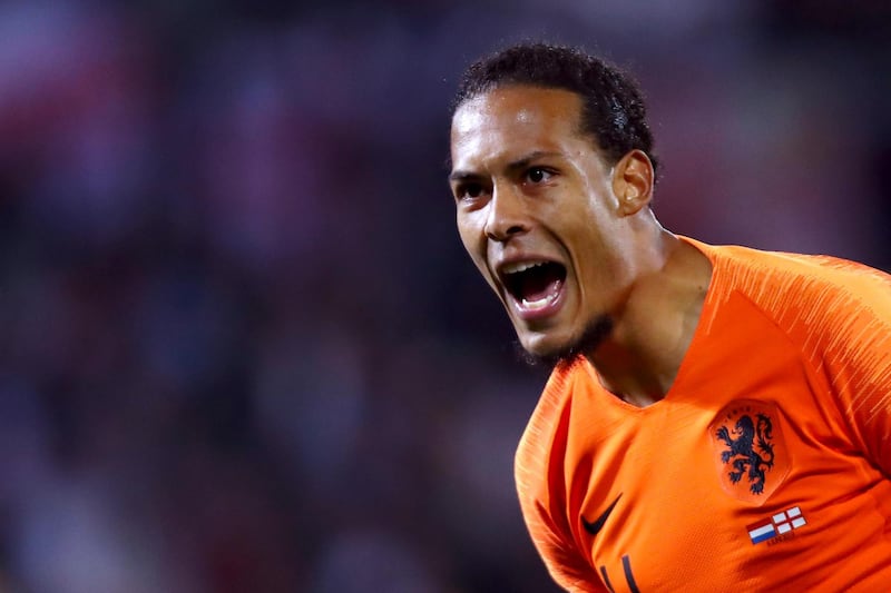 Virgil van Dijk of The Netherlands reacts to the goal scored by Quincy Promes during the UEFA Nations League semi-final match between the Netherlands and England. Getty Images
