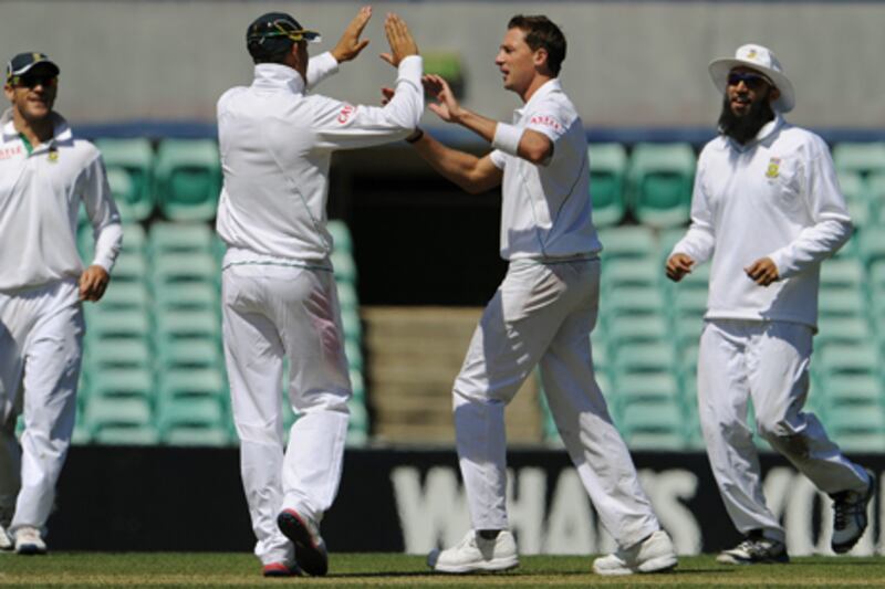 South Africa bowler Dale Steyn is congratulated after taking another wicket against Australia A in Sydney