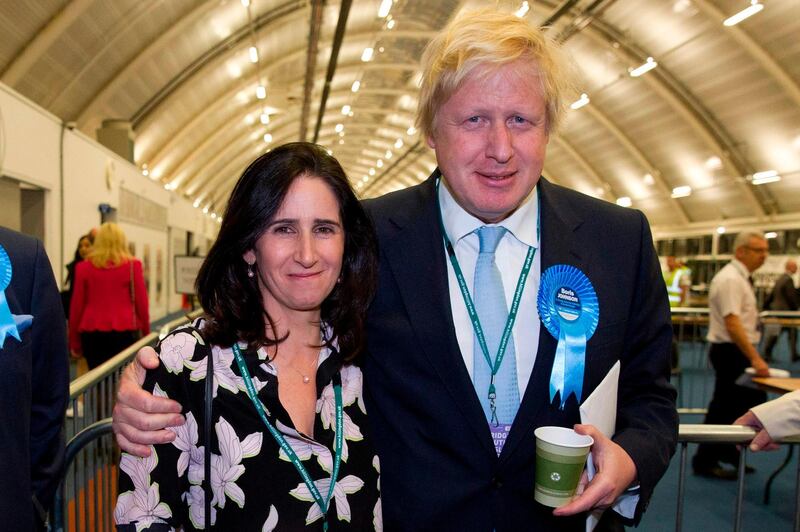 (FILES) In this file photo taken on May 08, 2015 London Mayor and Conservative Party parliamentary candidate for Uxbridge and Ruislip South, Boris Johnson (R) and his wife Marina Wheeler (L) pose after winning his seat in Uxbridge, west London in the British general election. - Britain's former foreign secretary Boris Johnson, who is tipped as a future prime minister, revealed on September 7, 2018 that he has separated from his wife and the couple are getting a divorce. (Photo by Justin TALLIS / AFP)