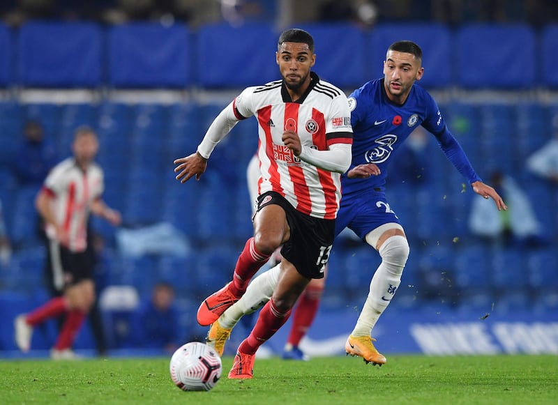 Sheffield United's Max Lowe with Chelsea's Hakim Ziyech. Reuters