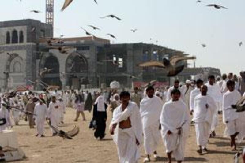 Pilgrims walking outside the Grand Mosque in the holy city of Makkah, Saudi Arabia, last December.