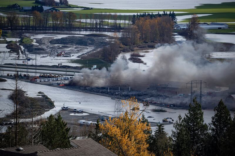 Recreational vehicles and trucks burn during a fire in Abbotsford.