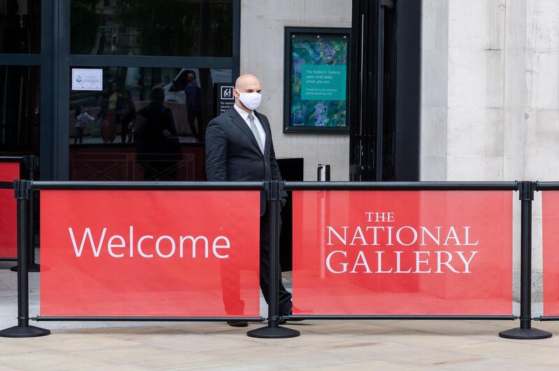 A member of security staff outside the National Gallery during preparations for reopening at the National Gallery London. A survey by Ipsos Mori reveals that 49 per cent of the British public do not yet feel comfortable with visiting indoor museums and exhibitions. EPA