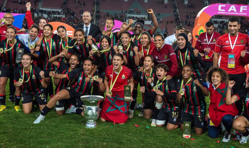 Rabat's players with the trophy after their 4-0 victory.