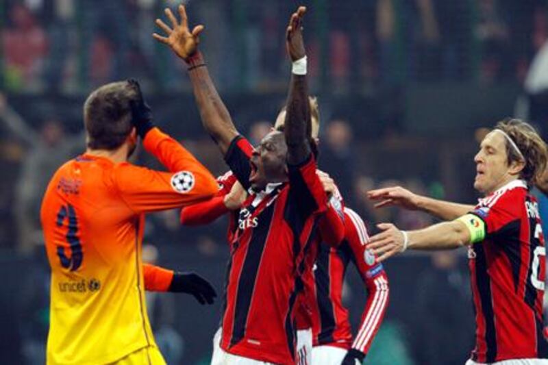 AC Milan's Sulley Muntari celebrates his goal against Barcelona in the Champions League.