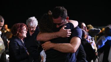People embrace at the 18th joint memorial ceremony, held in Tel Aviv, in May 2023. Photo: Combatants for Peace