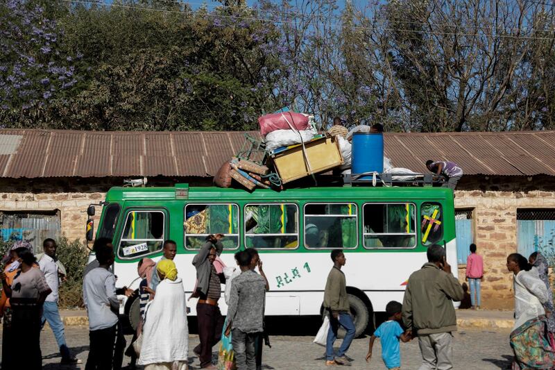 FILE PHOTO: A bus carrying displaced people arrives at the Tsehaye primary school, which was turned into a temporary shelter for people displaced by conflict, in the town of Shire, Tigray region, Ethiopia, March 14, 2021. REUTERS/Baz Ratner/File Photo