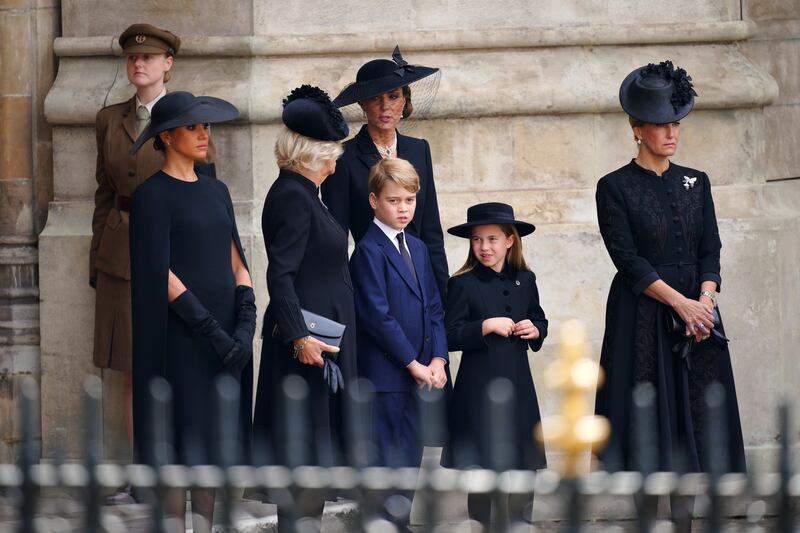 The Duchess of Sussex, the Queen Consort, Prince George, the Princess of Wales, Princess Charlotte and the Countess of Wessex leaving the State Funeral of Queen Elizabeth II, at Westminster Abbey, London. PA