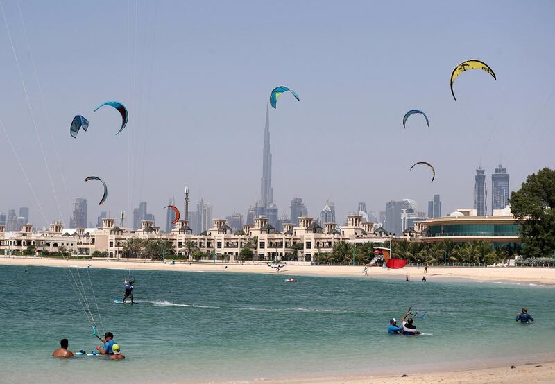 Dubai, United Arab Emirates - Reporter: N/A. News. Standalone. Kite surfers fill the sky as people go to the beach on a hot day in Dubai. Monday, June 22nd, 2020. Jumeriah, Dubai. Chris Whiteoak / The National