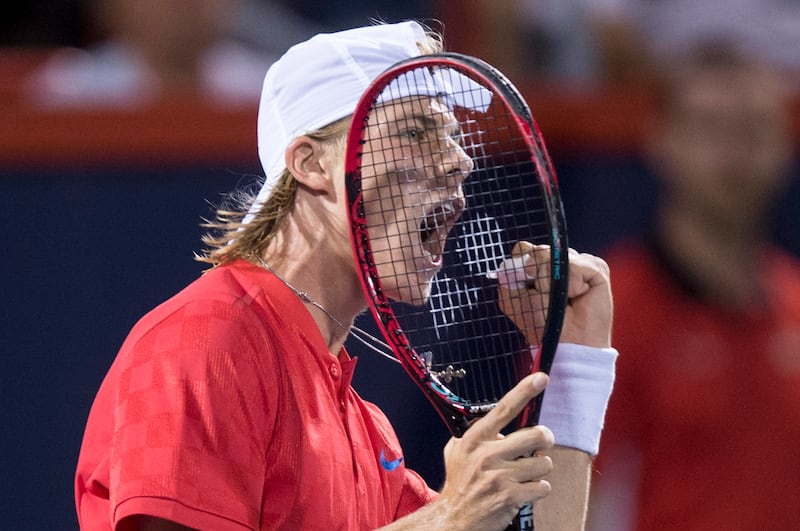 Denis Shapovalov, of Canada, celebrates winning a point over Rafael Nadal, of Spain, at the Rogers Cup tennis tournament Thursday, Aug. 10, 2017, in Montreal. (Paul Chiasson/The Canadian Press via AP)