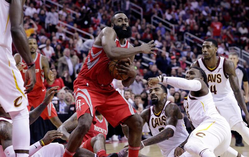 Houston Rockets guard James Harden (13) looks to pass after coming up with a loose ball during the second half of an NBA basketball game against the Cleveland Cavaliers on Thursday, Nov. 9, 2017, in Houston. (AP Photo/Michael Wyke)