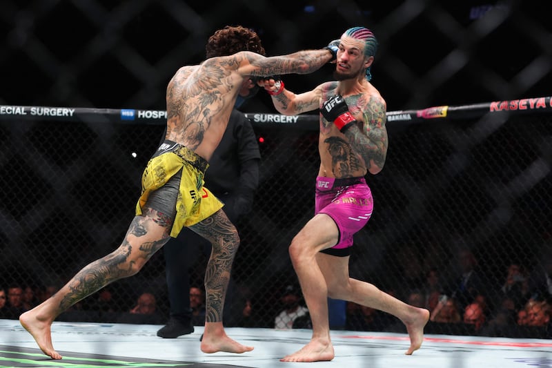 Marlon Vera lands a right hand on Sean O'Malley, right,  during their UFC bantamweight title bout at UFC 299 at Kaseya Center on March 09, 2024 in Miami, Florida. Getty