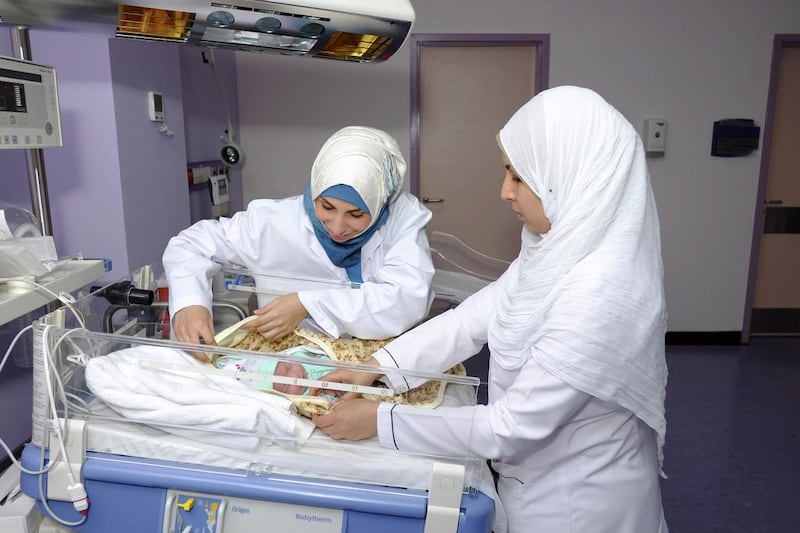Nurses look after a new-born girl at the Dh750million Sheikh Khalifa General Hospital in Umm Al Quwain. Antonie Robertson / The National 