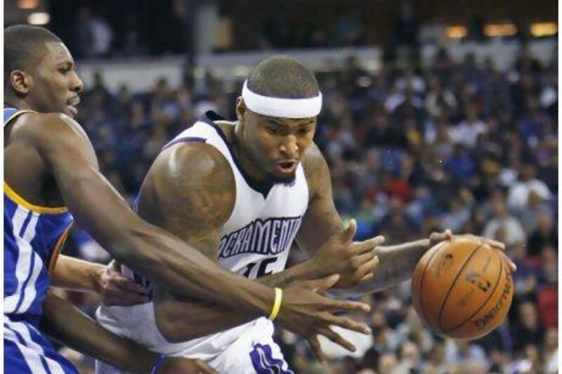 Sacramento Kings centre DeMarcus Cousins, right, has been difficult for management and the coaching staff to deal with. Observers say it may be time for the team to finally trade the talented player.