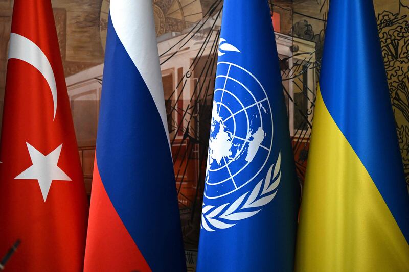 A Turkish national flag, a Russian national flag, a United Nations flag and a Ukrainian national flag in Istanbul, before the deal was signed. AFP