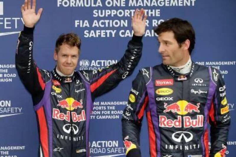 Red Bull driver Sebastian Vettel, left, ignored team orders, passed teammate Mark Webber and won the Malaysian Grand Prix last month. The Formula One season resumes at this weekend's Chinese Grand Prix. Rob Griffith / AP Photo