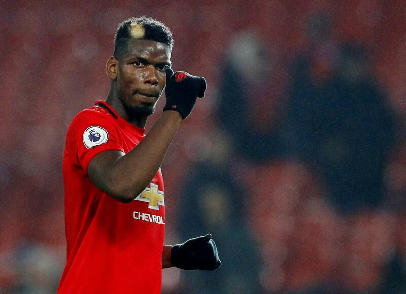 FILE PHOTO: Soccer Football - Premier League - Manchester United v Newcastle United - Old Trafford, Manchester, Britain - December 26, 2019  Manchester United's Paul Pogba acknowledges fans after the match          REUTERS/Phil Noble  EDITORIAL USE ONLY. No use with unauthorized audio, video, data, fixture lists, club/league logos or "live" services. Online in-match use limited to 75 images, no video emulation. No use in betting, games or single club/league/player publications.  Please contact your account representative for further details./File Photo