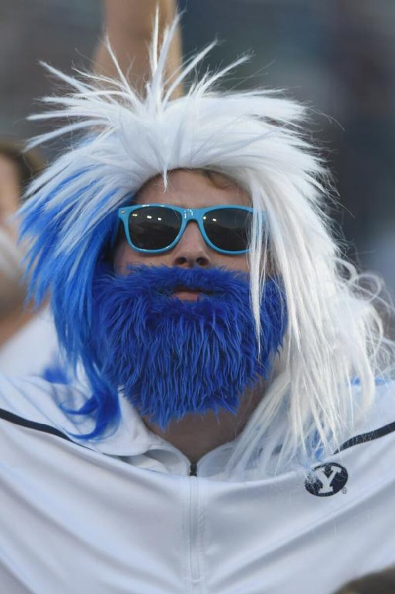 A costumed Brigham Young Cougar fan in the stands before the start of their game against the UCLA Bruins at LaVell Edwards Stadium in Provo, Utah. Gene Sweeney Jr / Getty Images / AFP