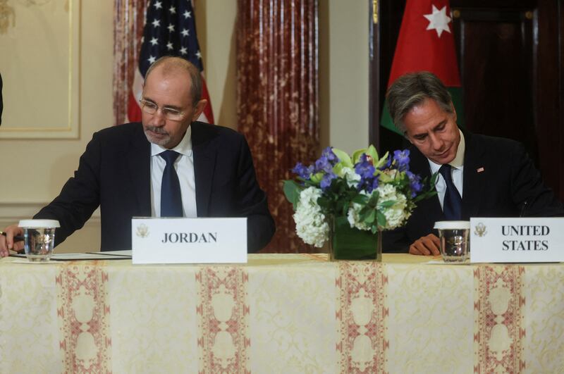 Jordan’s Deputy Prime Minister and Minister of Foreign Affairs Ayman Safadi and US Secretary of State Antony Blinken sign the agreement at the State Department in Washington. Reuters