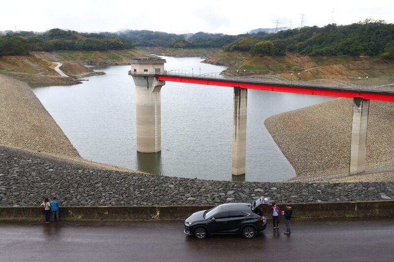 Tourists visit the Baoshan second reservoir amid low water levels during an islandwide drought, in Hsinchu, Taiwan March 6, 2021. Picture taken March 6, 2021. REUTERS/Ann Wang